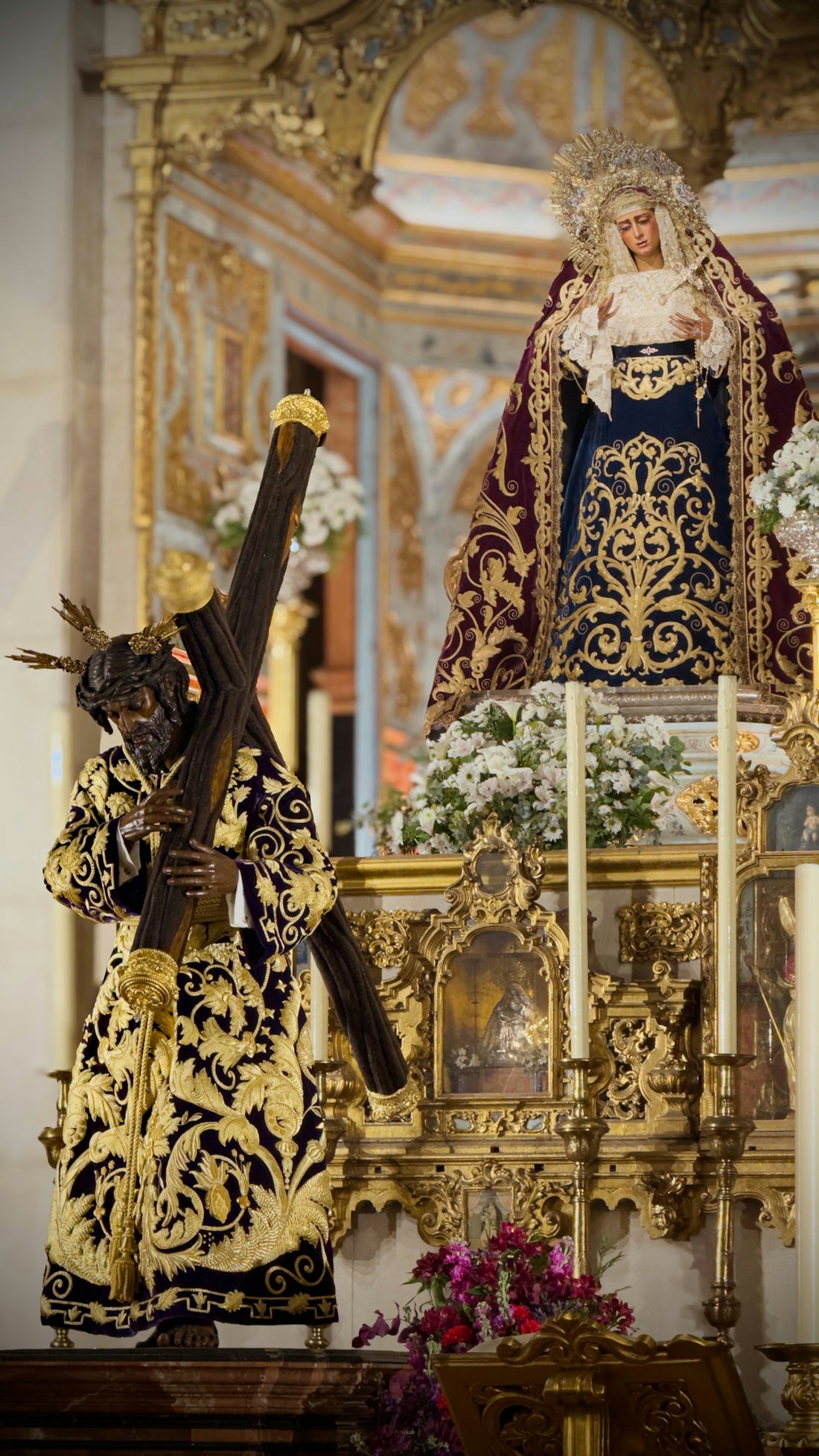 Statues of jesus carrying cross and virgin mary